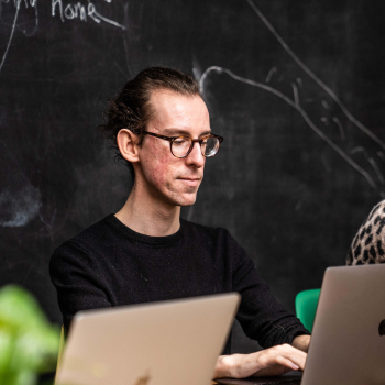 Nick working on laptop